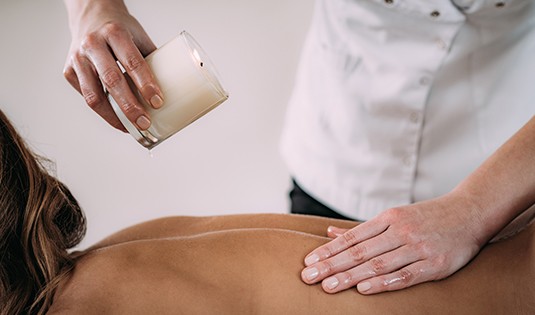 image1 A person is getting their back examined by an acupunct.