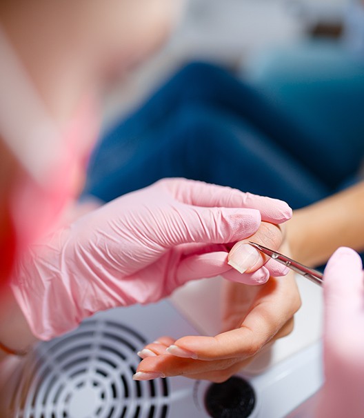 image2 A person is getting their nails done